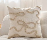 Cream bow boucle detailed cushion with insert 45 x 45 cm