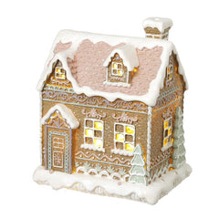 Light up snowy gingerbread house