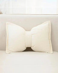 Cream Bow shaped cushion including insert 30 x 50 cm