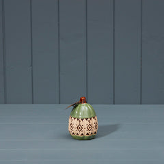 Green and cream ceramic pumpkin