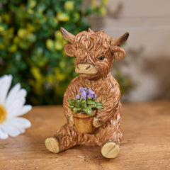 HIGHLAND COW WITH FLOWER IN PLANT POT RESIN ORNAMENT