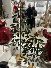Metal tree with red berries