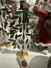 Green metal tree with red berries