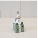 Green Snowman sitting on LED Present